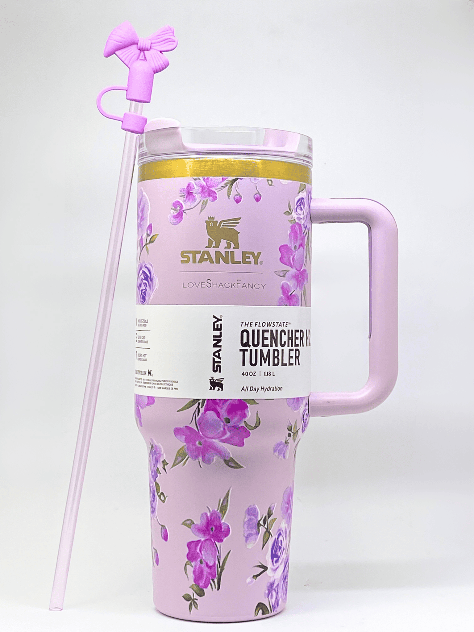 Pink floral Stanley tumbler with a straw